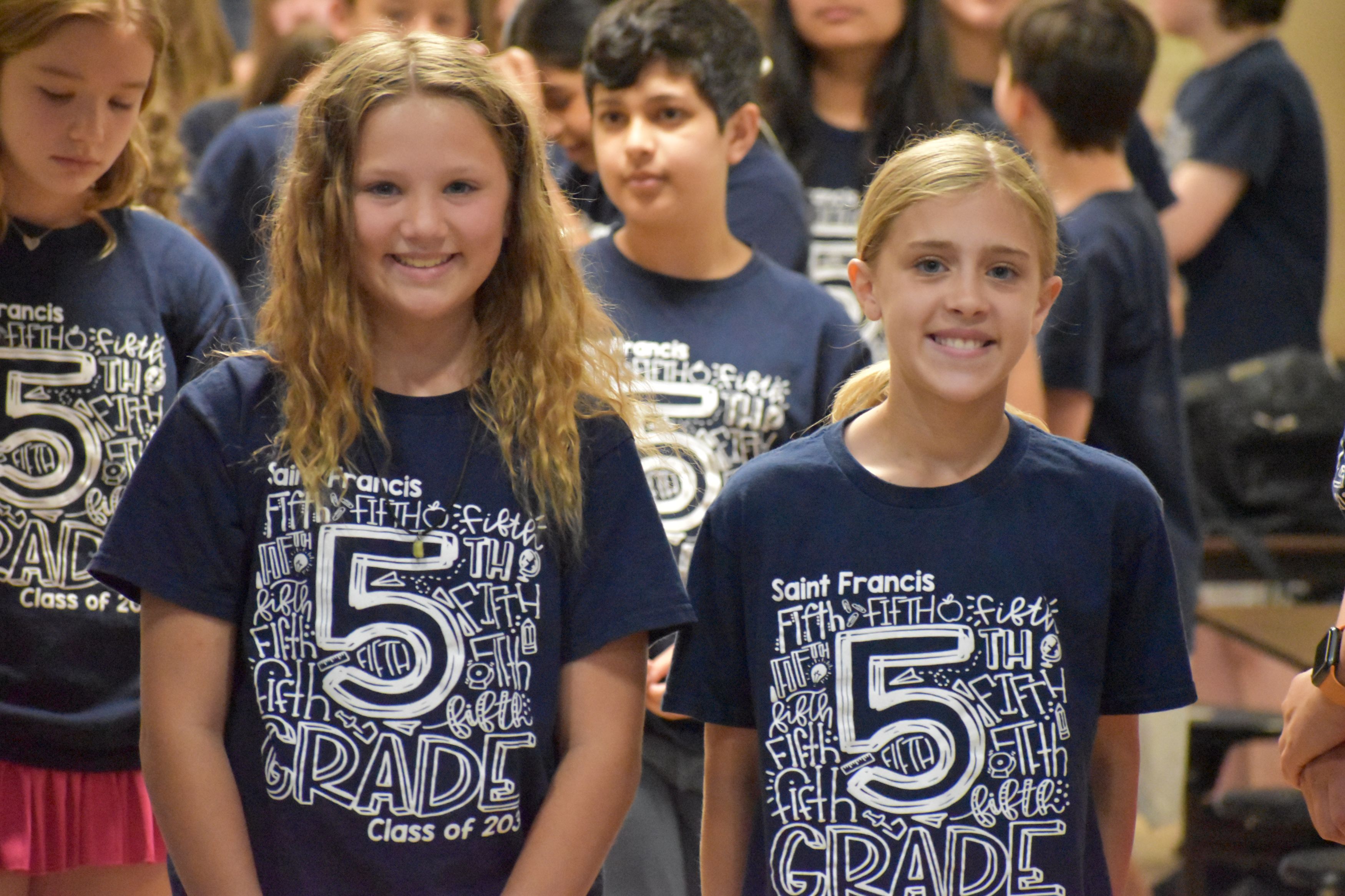 School-issued assignment books help students track homework, tests, and projects at Saint Francis Elementary School
