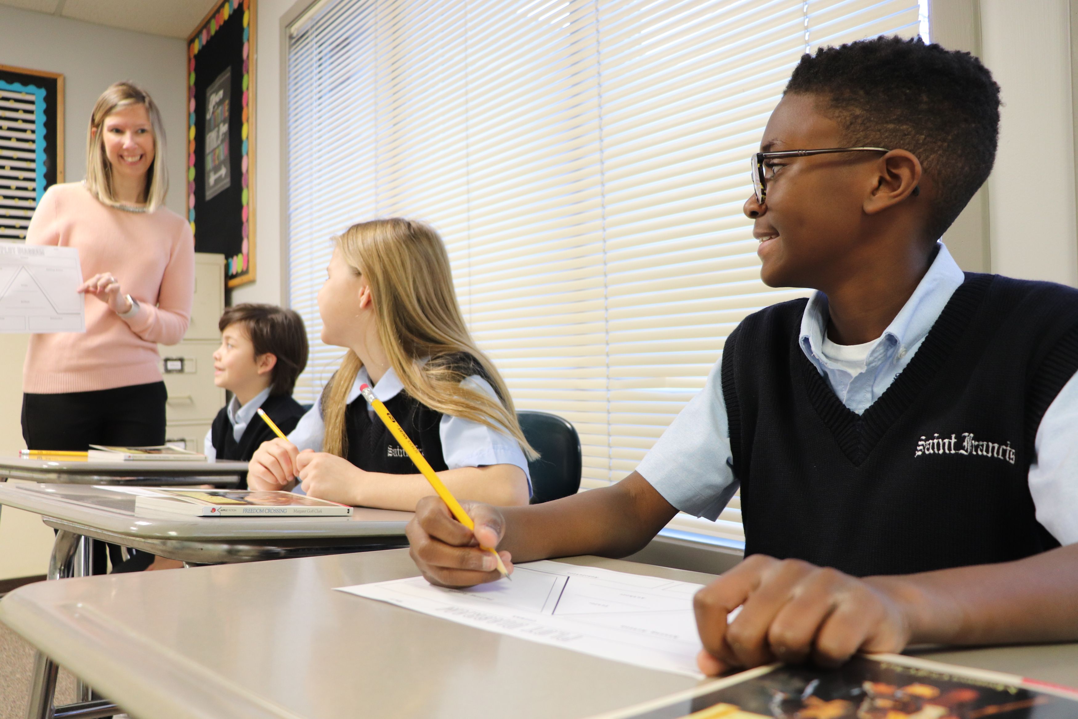 Middle School Students in a classroom receiving instruction