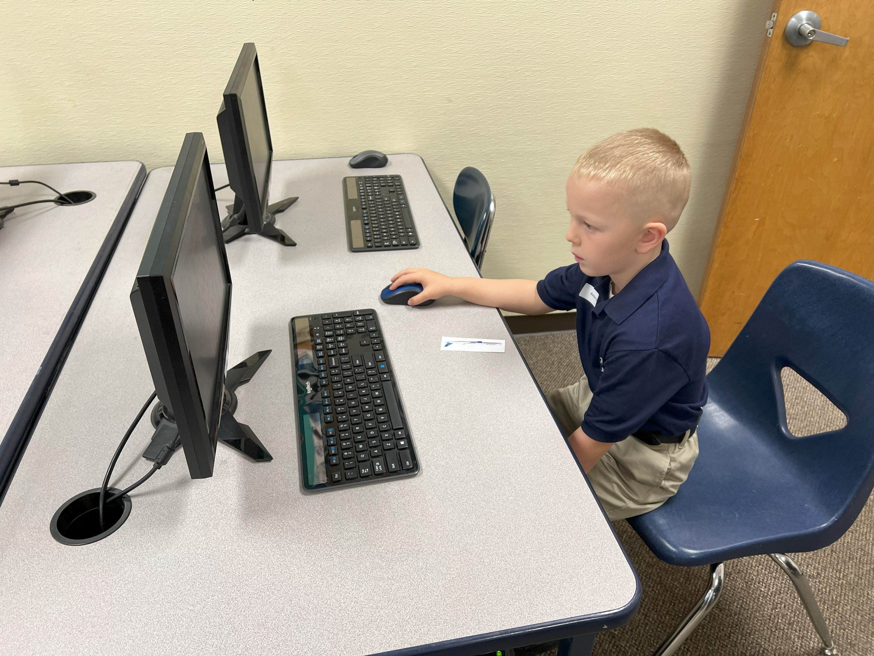 Saint Francis Elementary School Computer club with student learning digital skills