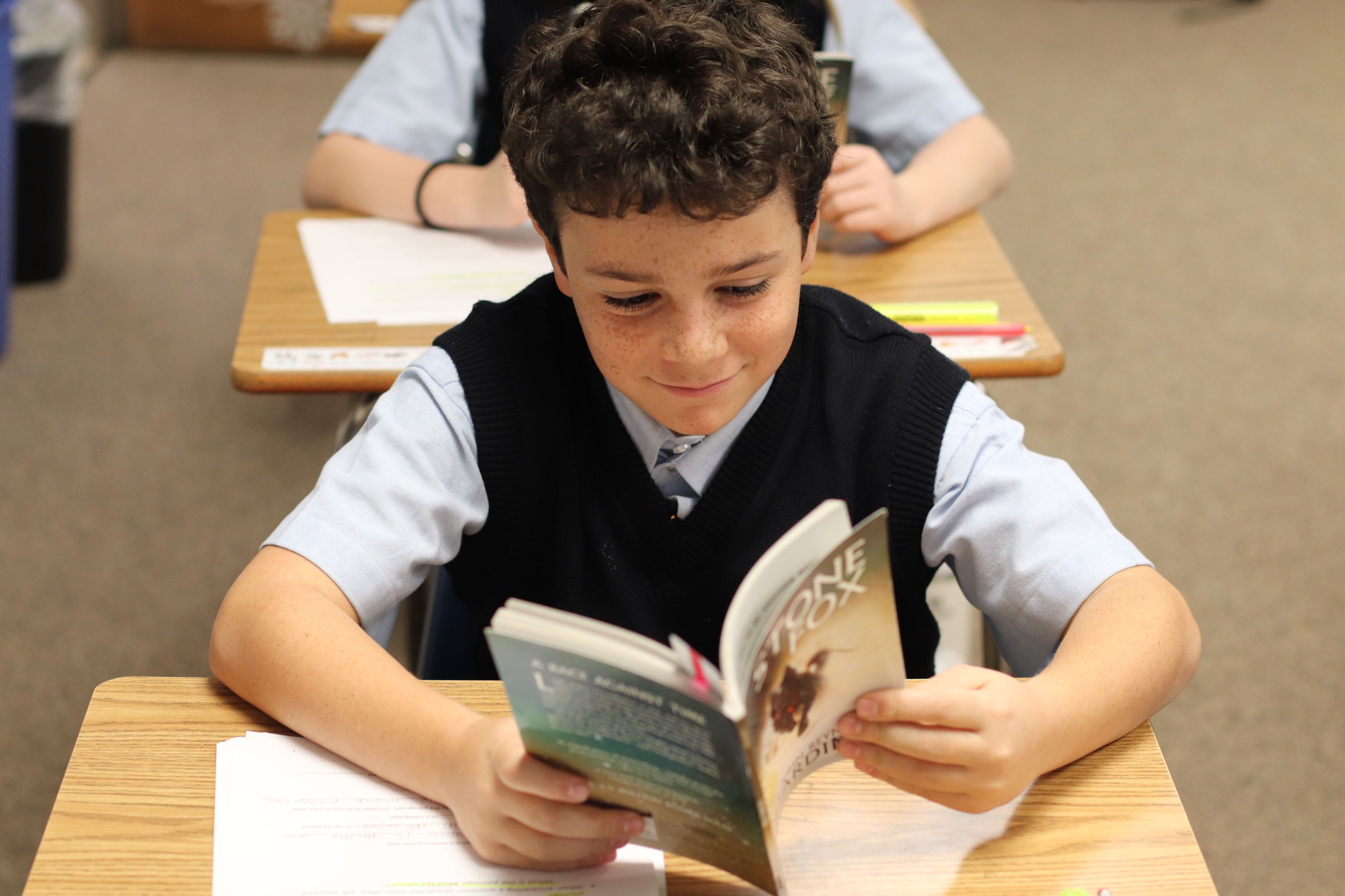 Student reading in Just Words Reading Program at Saint Francis School
