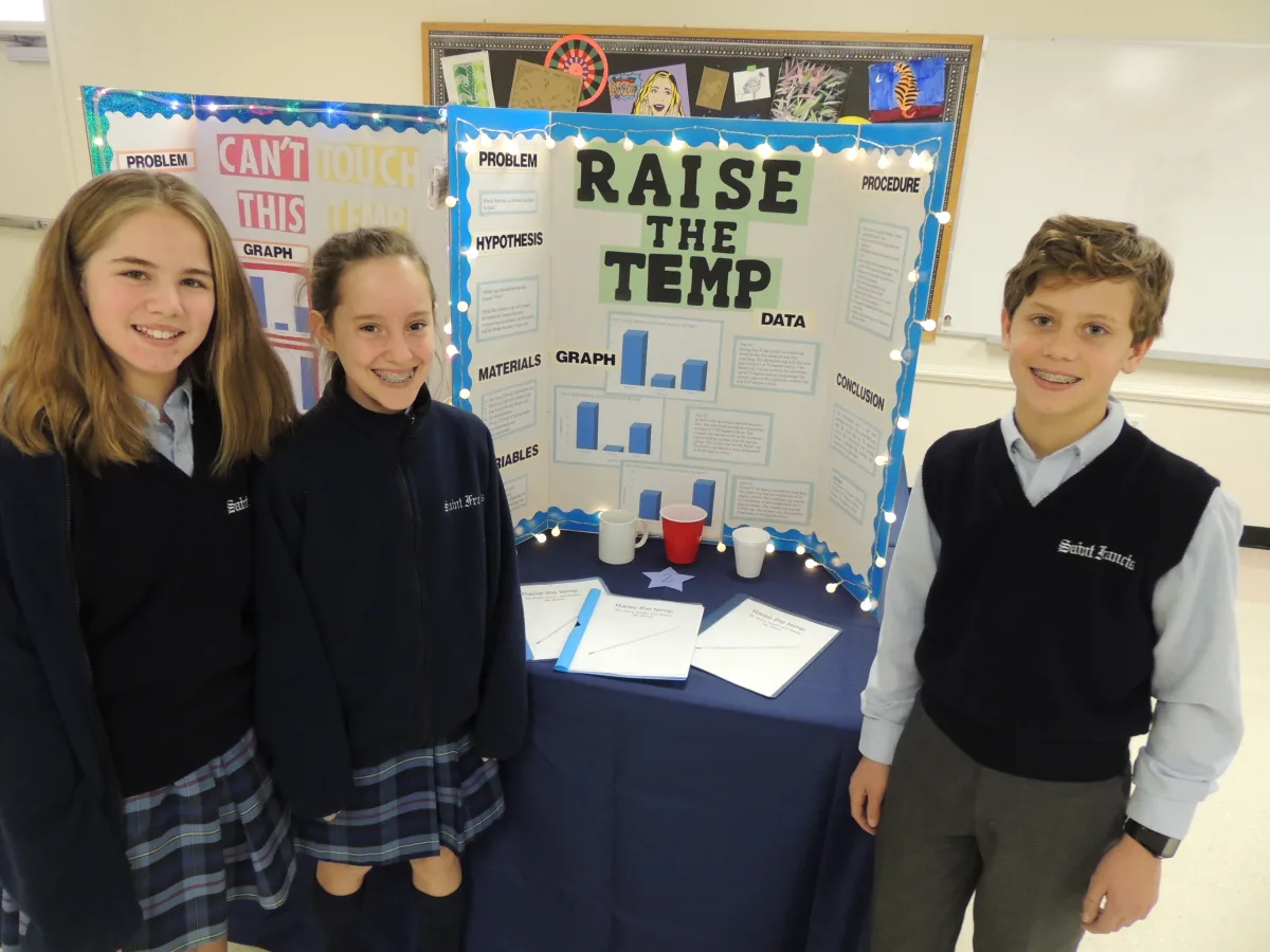 Saint Francis Middle School students with their science project
